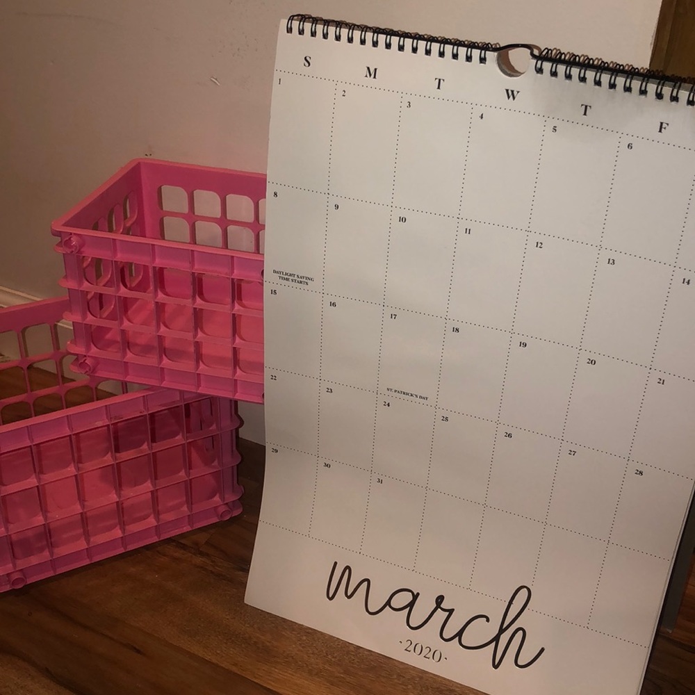 Used calendar with two pink crates